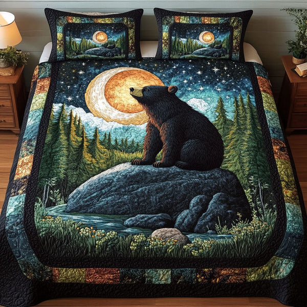 Moonlit Guardian quilted 3-piece bedding set on a made bed with two matching pillow shams