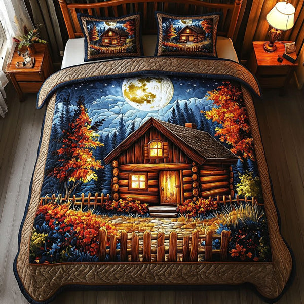 Moonlit Haven quilted 3-piece bedding set on a made bed with two matching pillow shams