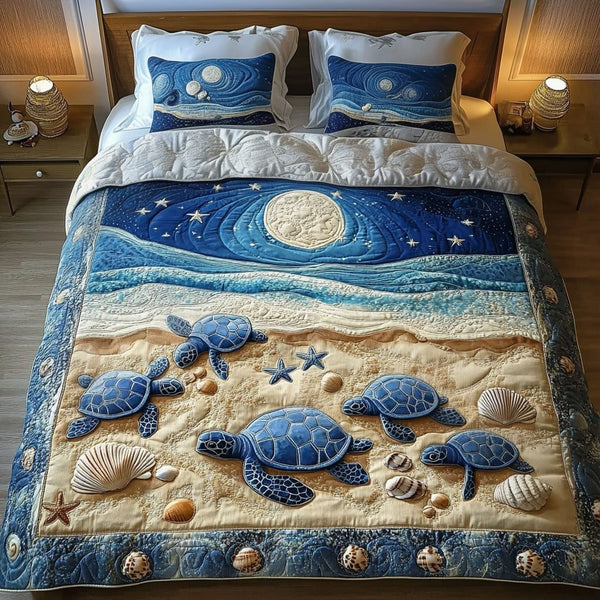 Moonlit Journey quilted 3-piece bedding set on a made bed with two matching pillow shams