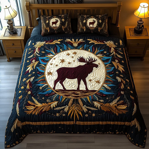 Moonlit Majesty quilted 3-piece bedding set on a made bed with two matching pillow shams