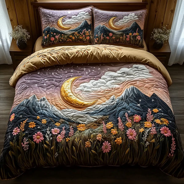 Moonlit Mountain Landscape quilted 3-piece bedding set on a made bed with two matching pillow shams