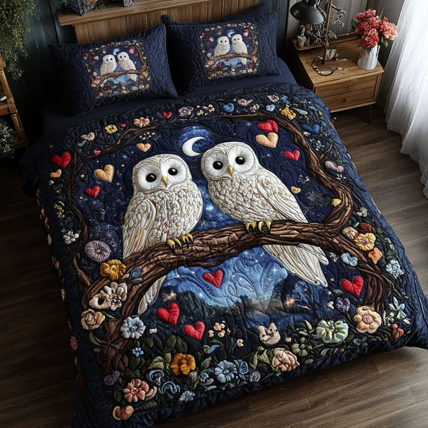 Moonlit Owls quilted 3-piece bedding set on a made bed with two matching pillow shams