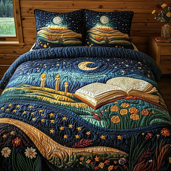 Moonlit Pages quilted 3-piece bedding set on a made bed with two matching pillow shams