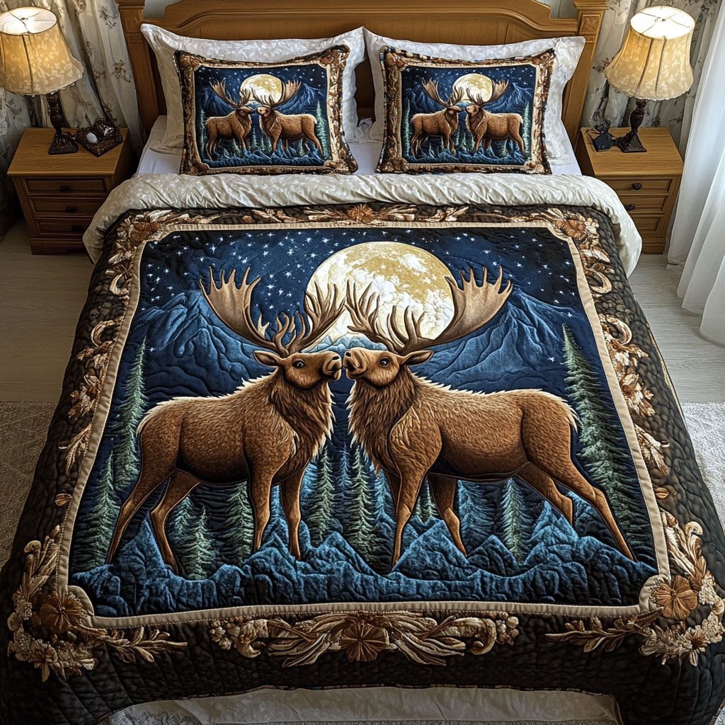 Moonlit Pair quilted 3-piece bedding set on a made bed with two matching pillow shams