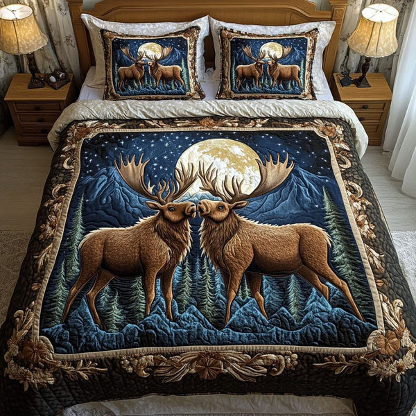 Moonlit Pair quilted 3-piece bedding set on a made bed with two matching pillow shams