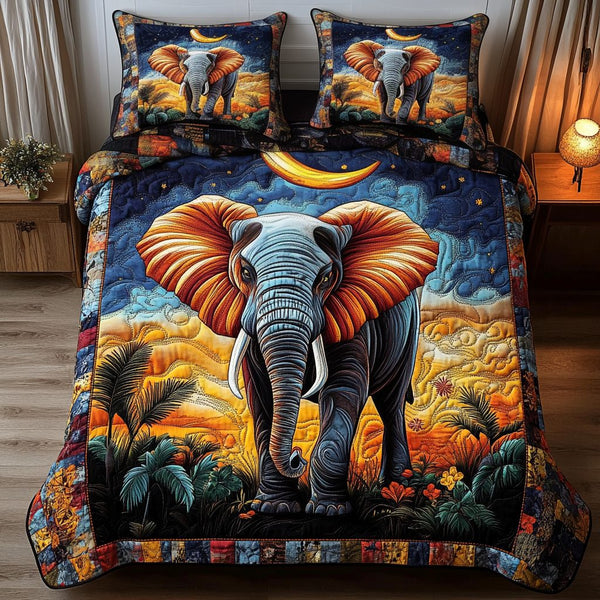 Moonlit Serenade Elephant quilted 3-piece bedding set on a made bed with two matching pillow shams