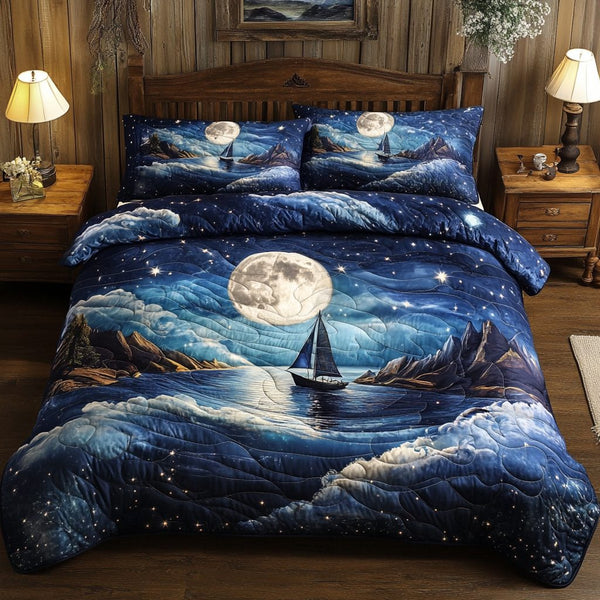 Moonlit Serenity quilted 3-piece bedding set on a made bed with two matching pillow shams