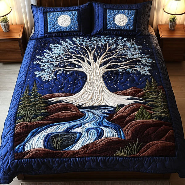 Moonlit White Tree quilted 3-piece bedding set on a made bed with two matching pillow shams
