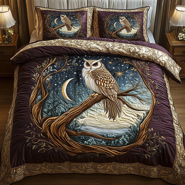 Moonlit Wisdom quilted 3-piece bedding set on a made bed with two matching pillow shams