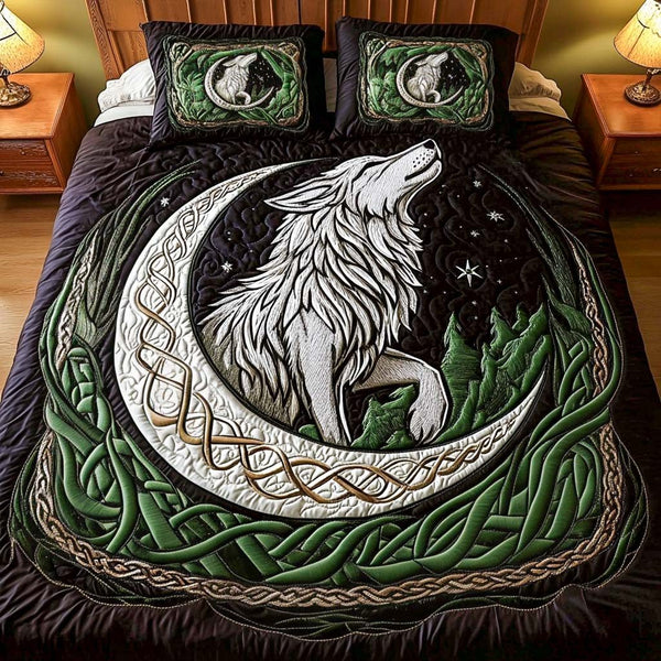 Moonlit Wolf quilted 3-piece bedding set on a made bed with two matching pillow shams