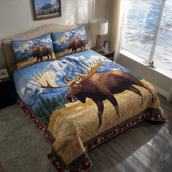 Moose Creek quilted 3-piece bedding set on a made bed with two matching pillow shams
