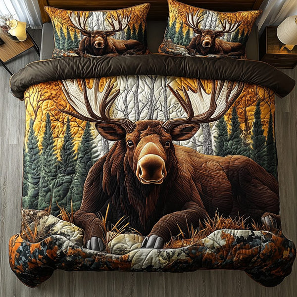 Moose Meadow quilted 3-piece bedding set on a made bed with two matching pillow shams