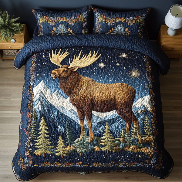Moose Night quilted 3-piece bedding set on a made bed with two matching pillow shams