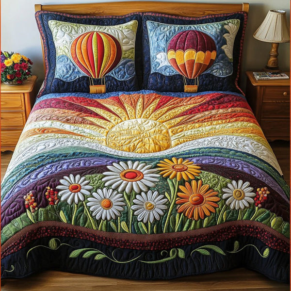 Morning Glory Skies quilted 3-piece bedding set on a made bed with two matching pillow shams