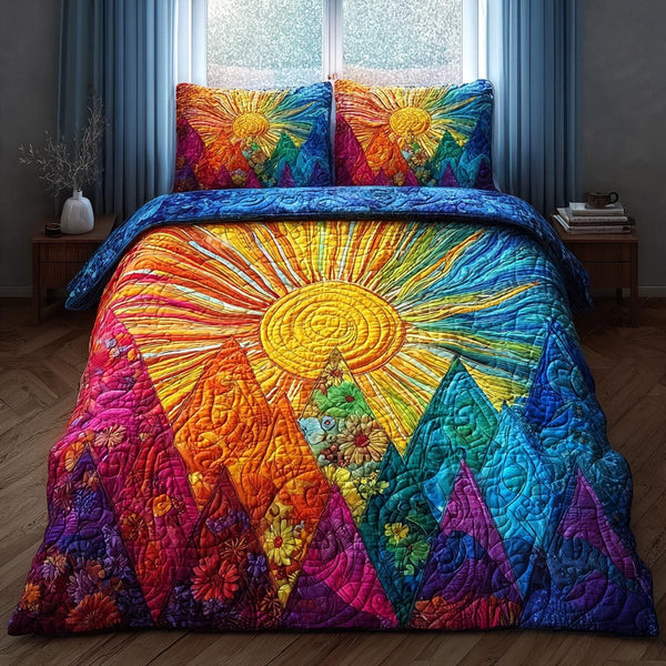 Morning Glow quilted 3-piece bedding set on a made bed with two matching pillow shams
