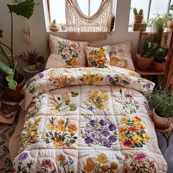 Morning Meadow quilted 3-piece bedding set on a made bed with two matching pillow shams