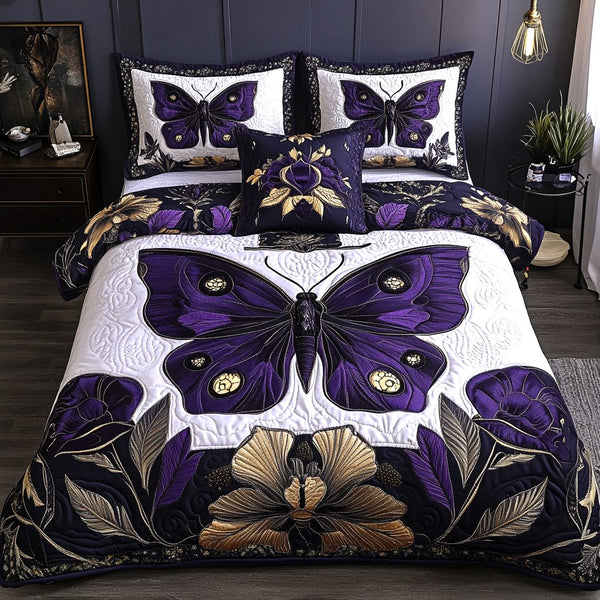 Moth Spell quilted 3-piece bedding set on a made bed with two matching pillow shams