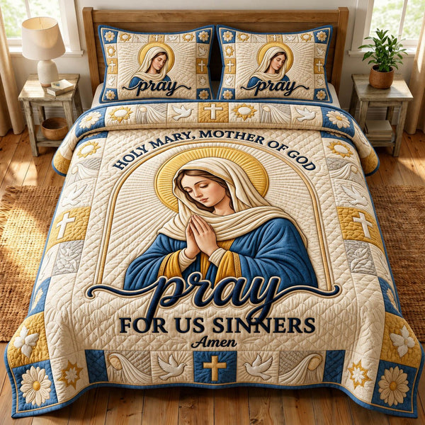 Mother Mary quilted 3-piece bedding set on a made bed with two matching pillow shams