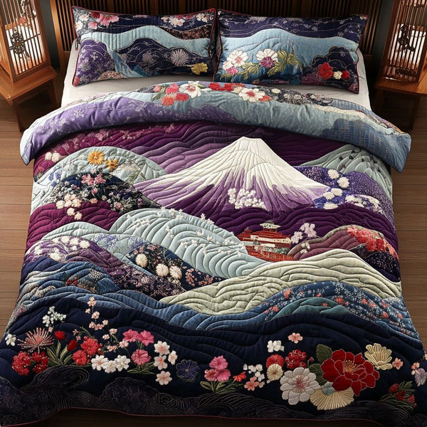 Mount Fuji Blossom quilted 3-piece bedding set on a made bed with two matching pillow shams