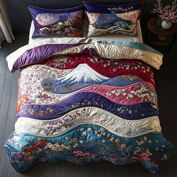 Mount Fuji Reflections quilted 3-piece bedding set on a made bed with two matching pillow shams