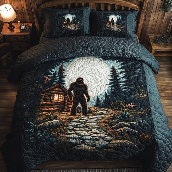Mountain Beast quilted 3-piece bedding set on a made bed with two matching pillow shams