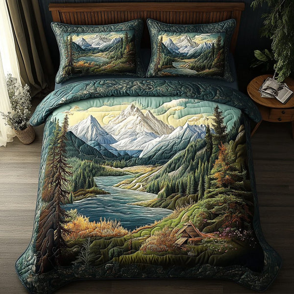 Mountain Bliss quilted 3-piece bedding set on a made bed with two matching pillow shams