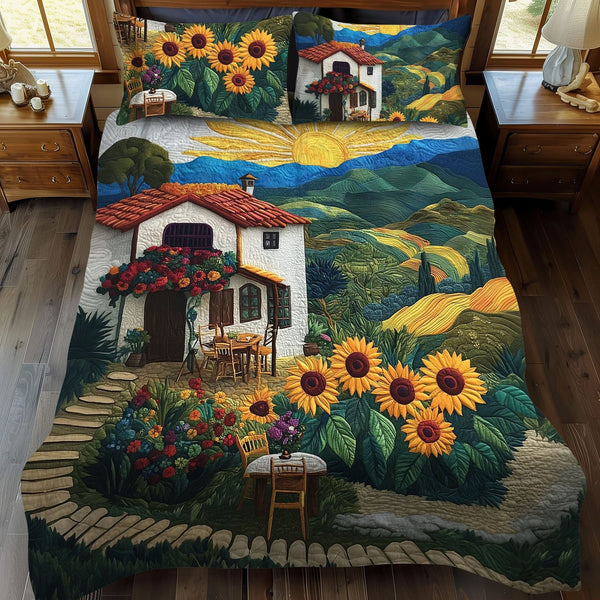 Mountain Bloom quilted 3-piece bedding set on a made bed with two matching pillow shams