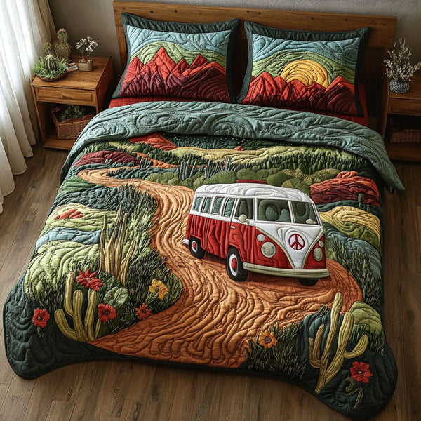 Mountain Bound quilted 3-piece bedding set on a made bed with two matching pillow shams