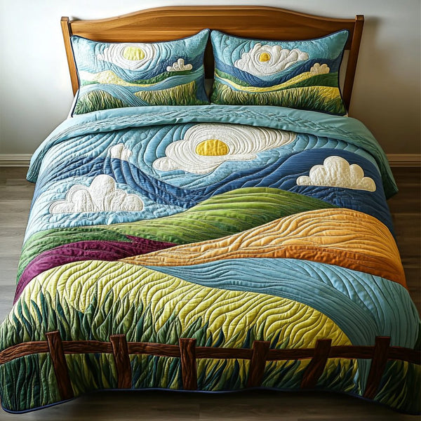 Mountain Breeze quilted 3-piece bedding set on a made bed with two matching pillow shams