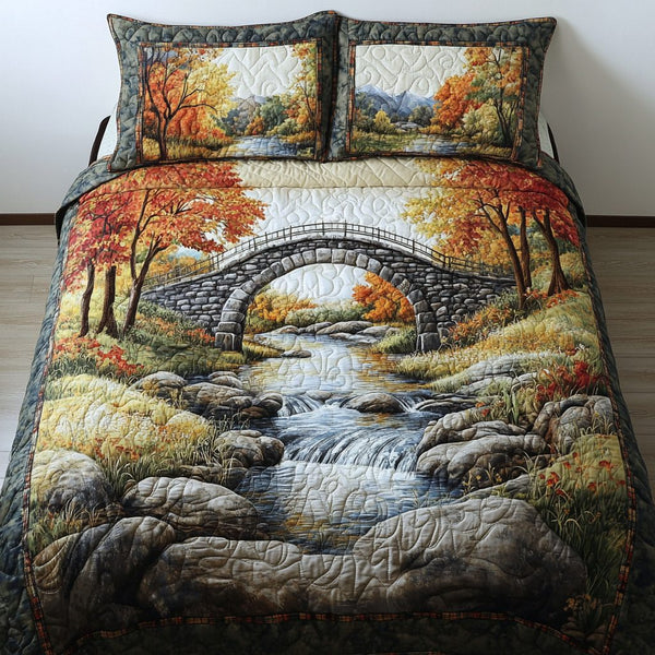 Mountain Breeze quilted 3-piece bedding set on a made bed with two matching pillow shams