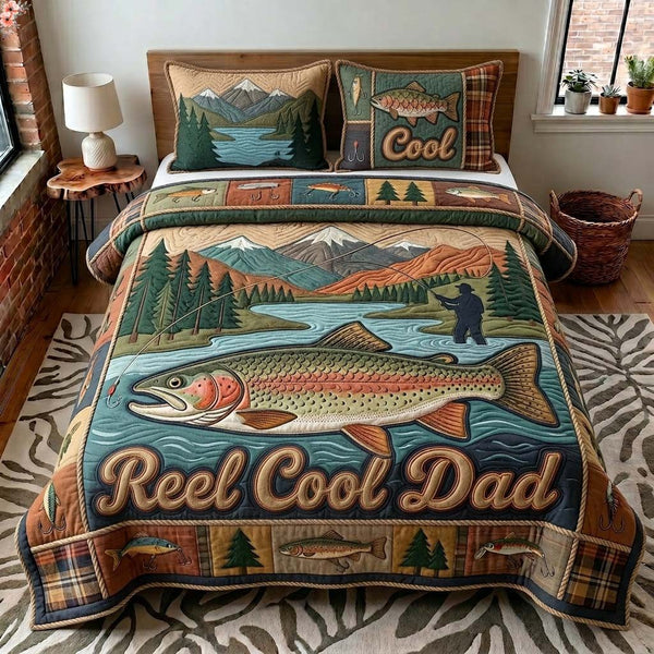 Mountain Catch Dad quilted 3-piece bedding set on a made bed with two matching pillow shams