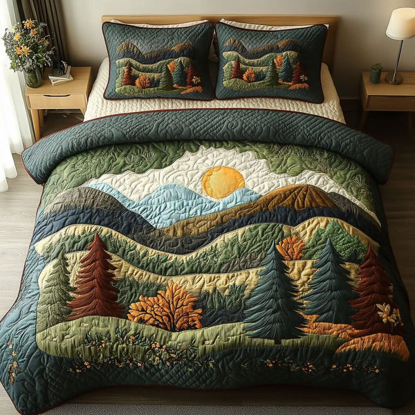 Mountain Dawn quilted 3-piece bedding set on a made bed with two matching pillow shams