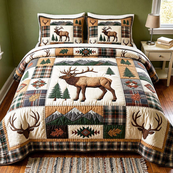 Mountain Elk quilted 3-piece bedding set on a made bed with two matching pillow shams