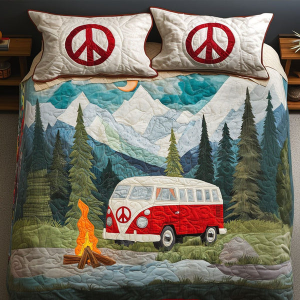 Mountain Escape quilted 3-piece bedding set on a made bed with two matching pillow shams