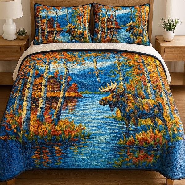 Mountain Escape quilted 3-piece bedding set on a made bed with two matching pillow shams