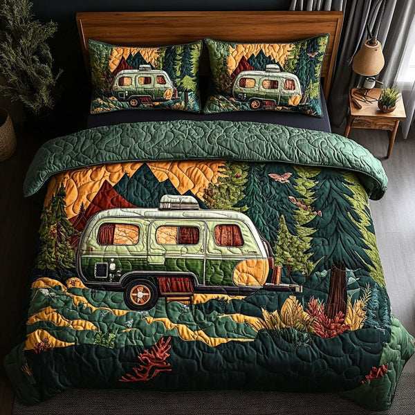 Mountain Expedition quilted 3-piece bedding set on a made bed with two matching pillow shams