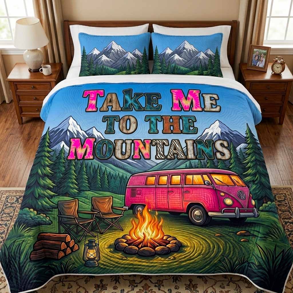 Mountain Fire quilted 3-piece bedding set on a made bed with two matching pillow shams
