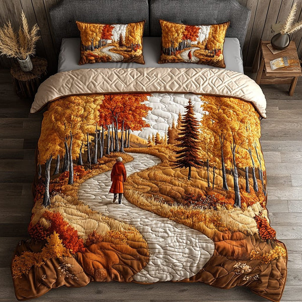 Mountain Glow quilted 3-piece bedding set on a made bed with two matching pillow shams