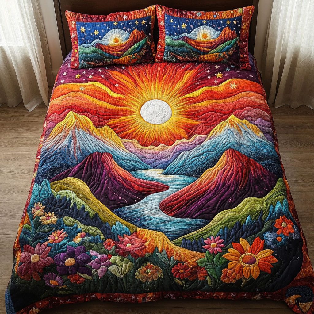 Mountain Glow quilted 3-piece bedding set on a made bed with two matching pillow shams