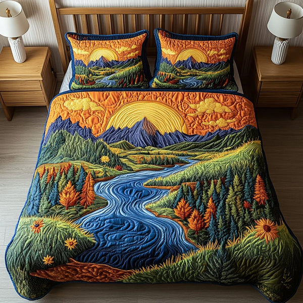 Mountain Glow quilted 3-piece bedding set on a made bed with two matching pillow shams
