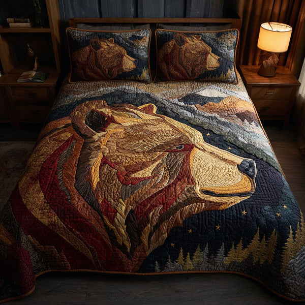 Mountain Haven quilted 3-piece bedding set on a made bed with two matching pillow shams