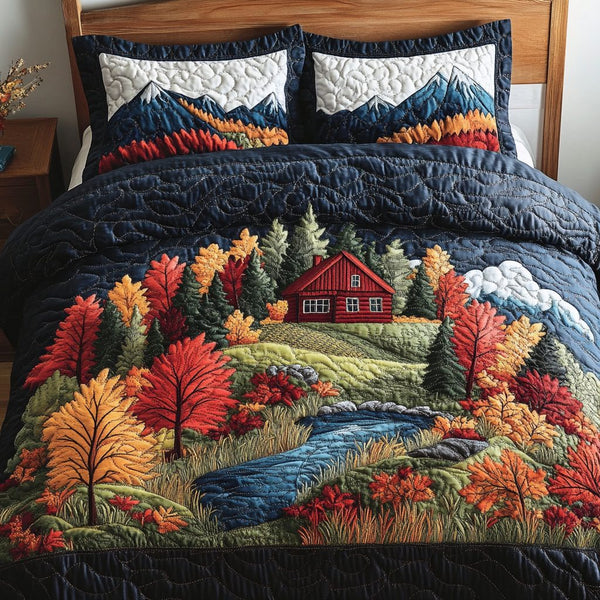 Mountain Haven quilted 3-piece bedding set on a made bed with two matching pillow shams