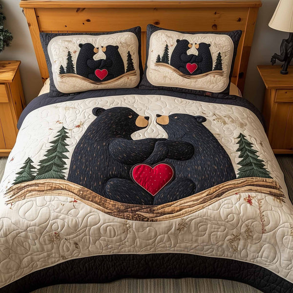 Mountain Love quilted 3-piece bedding set on a made bed with two matching pillow shams