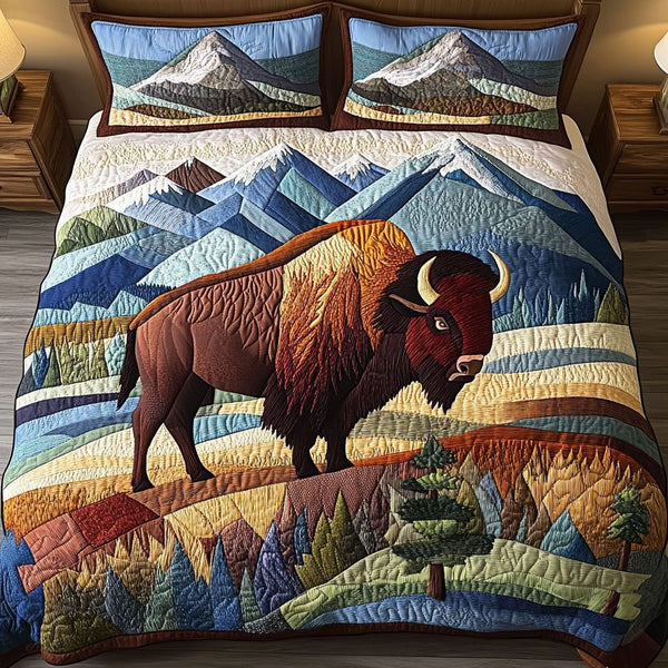 Mountain Majesty quilted 3-piece bedding set on a made bed with two matching pillow shams