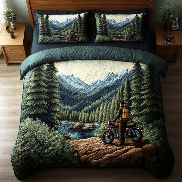 Mountain Ride quilted 3-piece bedding set on a made bed with two matching pillow shams