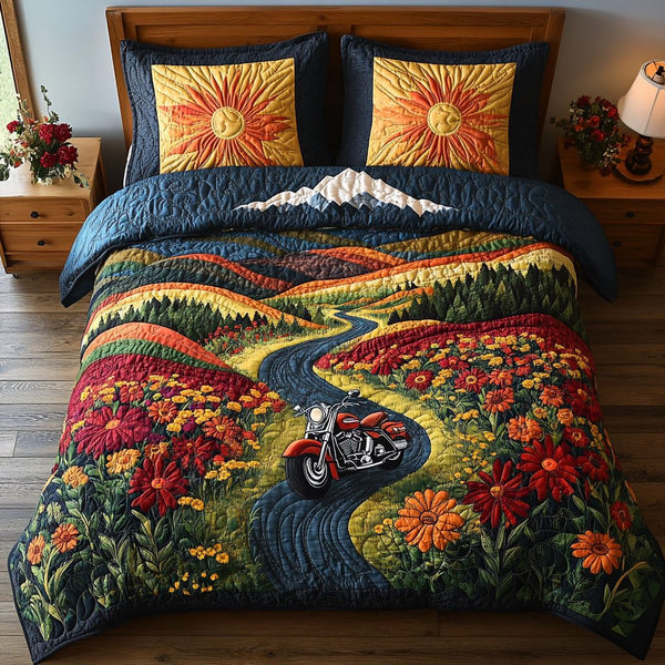 Mountain Road Run quilted 3-piece bedding set on a made bed with two matching pillow shams