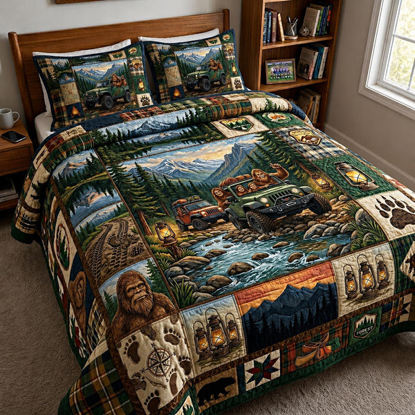 Mountain Roam quilted 3-piece bedding set on a made bed with two matching pillow shams