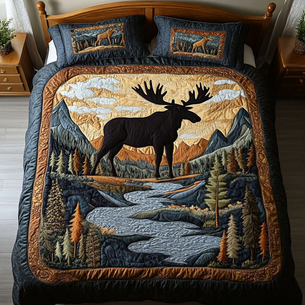 Mountain Serenity quilted 3-piece bedding set on a made bed with two matching pillow shams
