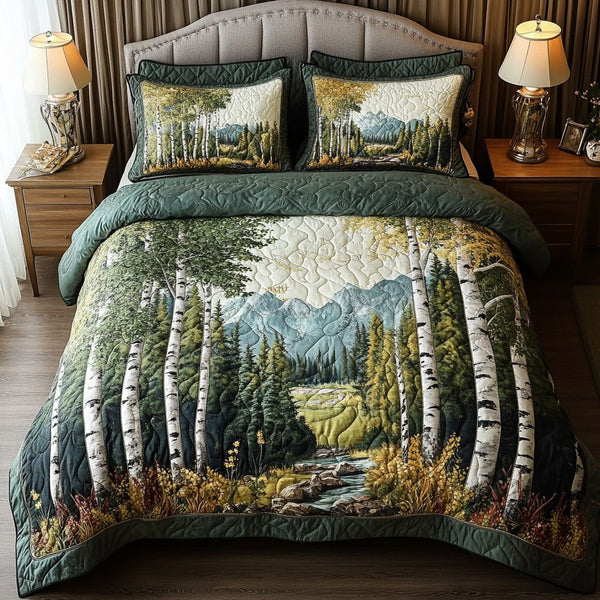Mountain Serenity quilted 3-piece bedding set on a made bed with two matching pillow shams