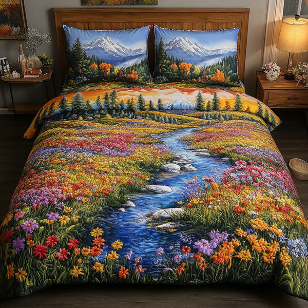 Mountain Stream Bliss quilted 3-piece bedding set on a made bed with two matching pillow shams